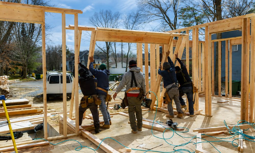 Crew framing a home renovation